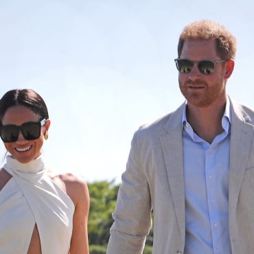 Meghan wears big smile during visit to Colombian music school with Harry