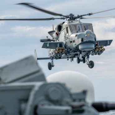 Member of Royal Navy personnel dies after helicopter ditches into Channel