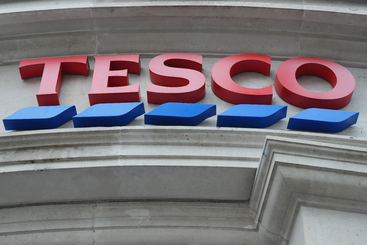 Tesco is predicting lower profits