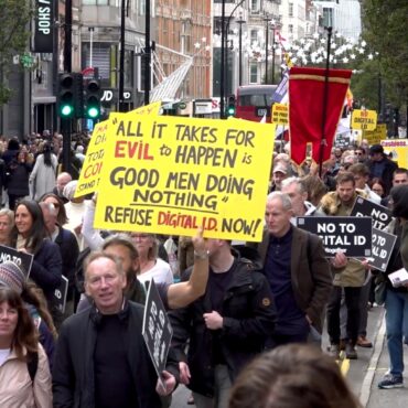 Thousands March Against Digital ID Plans